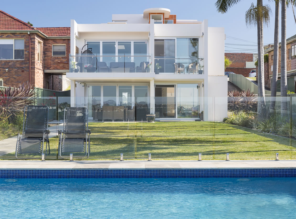 Custom-Built Waterfront Pool Thru Backyard